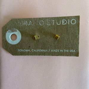 Gold stud earrings